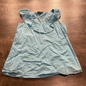 sleeveless ruffle collar top